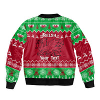 Red and green Christmas bomber jacket with back graphic, Welsh text, and 'Your Text'