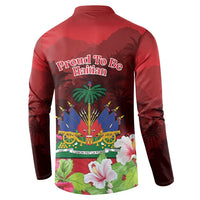 Red long-sleeve button sweatshirt, back text “Proud To Be Haitian” with parade fireworks graphic.