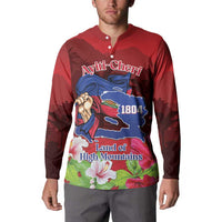 Red button henley sweatshirt with front Ayiti-Cheri logo, 1804 map graphic, and flowers.