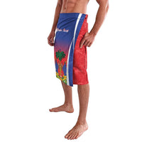 Blue and red swim trunks with diagonal stripe and tropical Haiti graphic, side view