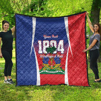 Personalized Haiti 1804 quilt laid out outdoors, blue left, red right, white center stripe