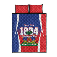 Quilt and two red pillows featuring Haiti 1804 crest with Republic banner