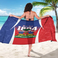 Personalized Haiti 1804 sarong draped across back, blue and red sides with 1804