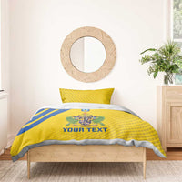 Yellow football bedding set with blue stripe, crest emblem, and 'YOUR TEXT' on duvet and pillow