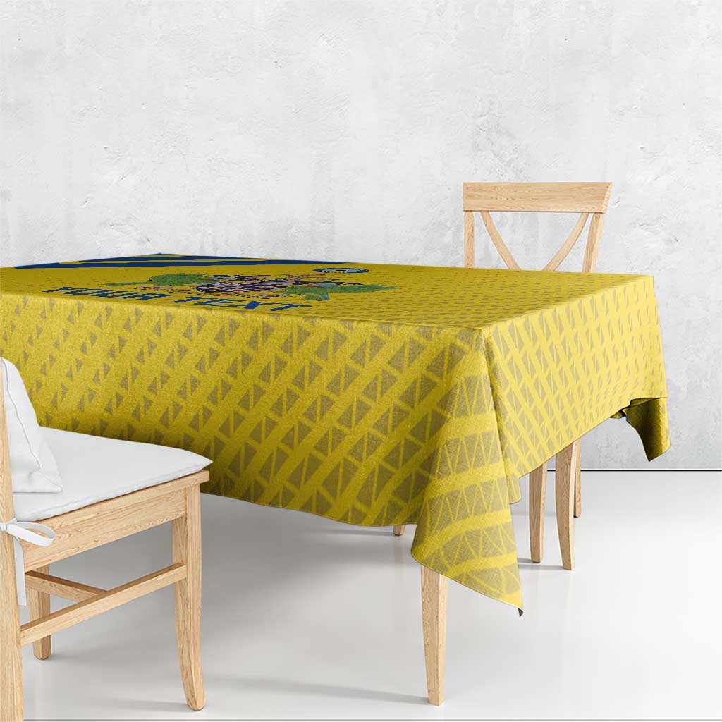 Yellow football tablecloth with repeating triangle pattern and blue stripe edge