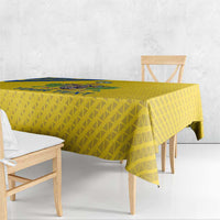 Yellow football tablecloth with repeating triangle pattern and blue stripe edge