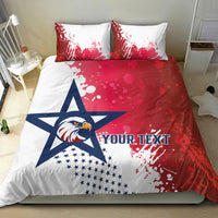 Red, white, and blue bedding set with eagle head over stars and splatter pattern on duvet