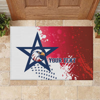 Red and white doormat with large navy star eagle logo and 'YOUR TEXT' lettering.
