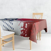 Custom rugby tablecloth draped over wood dining table, red and patriotic star pattern