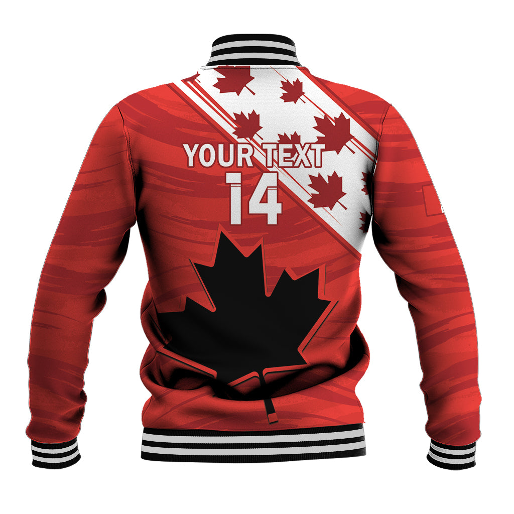 Red baseball varsity jacket back with YOURTEXT 14, maple leaf graphics, ribbed striped cuffs