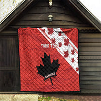 Red quilt with diagonal white maple stripes, black Canucks leaf-star, and 'YOUR TEXT'