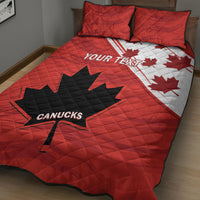 Red quilt bed set with black and white maple leaf design, CANUCKS and two pillow shams