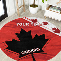 Red round rug with black maple leaf and CANUCKS lettering, YOUR TEXT across top stripe