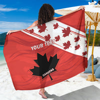 Red and white sarong close-up with maple leaves, Your Text, and Canucks logo