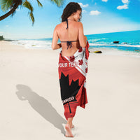 Red and white Canada-themed rugby-style sarong with maple leaves and Canucks logo