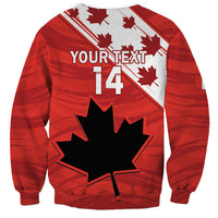 Red sweatshirt with large black maple leaf, YOUR TEXT, and 14 front print