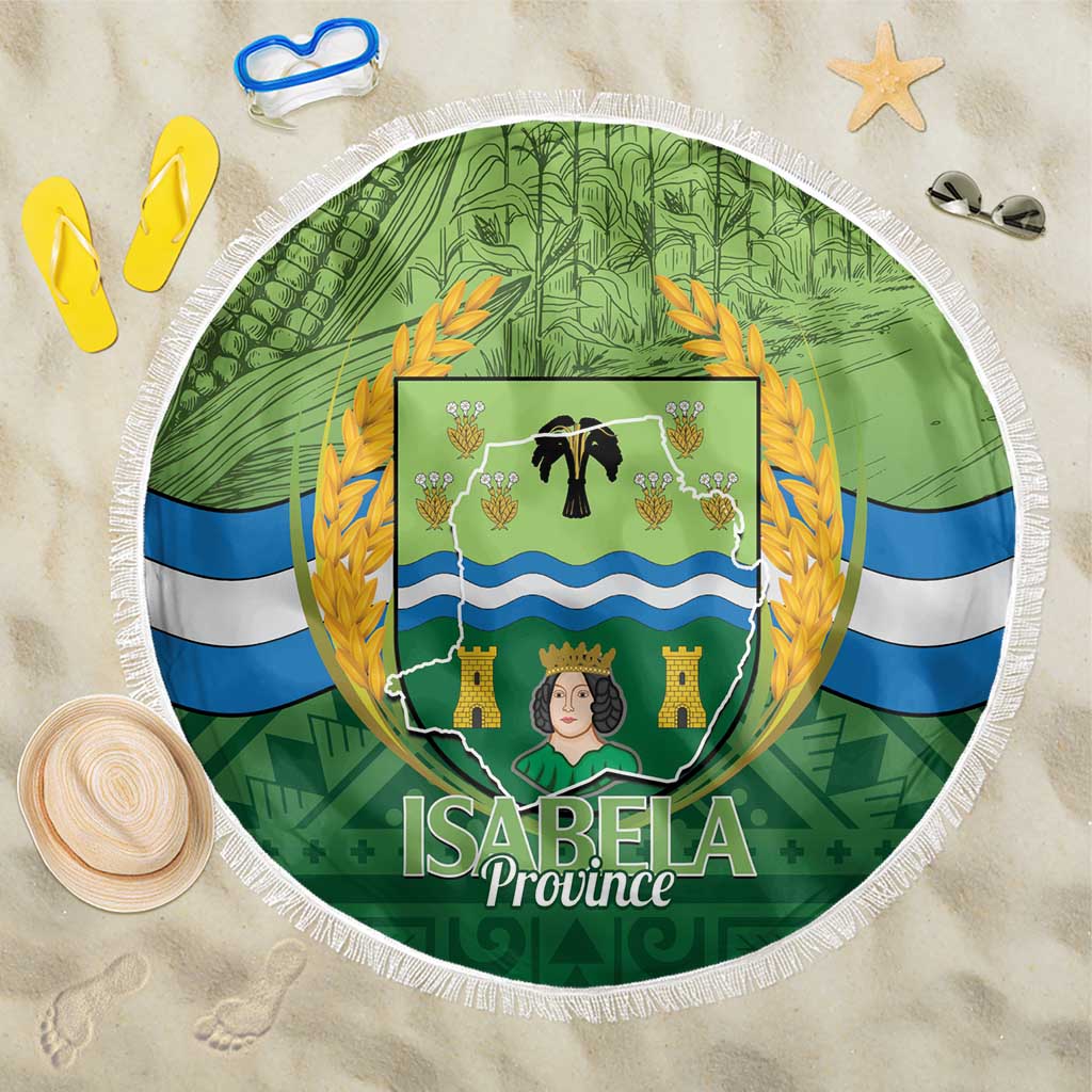 Green round beach blanket with white fringe and Isabela Province emblem in center