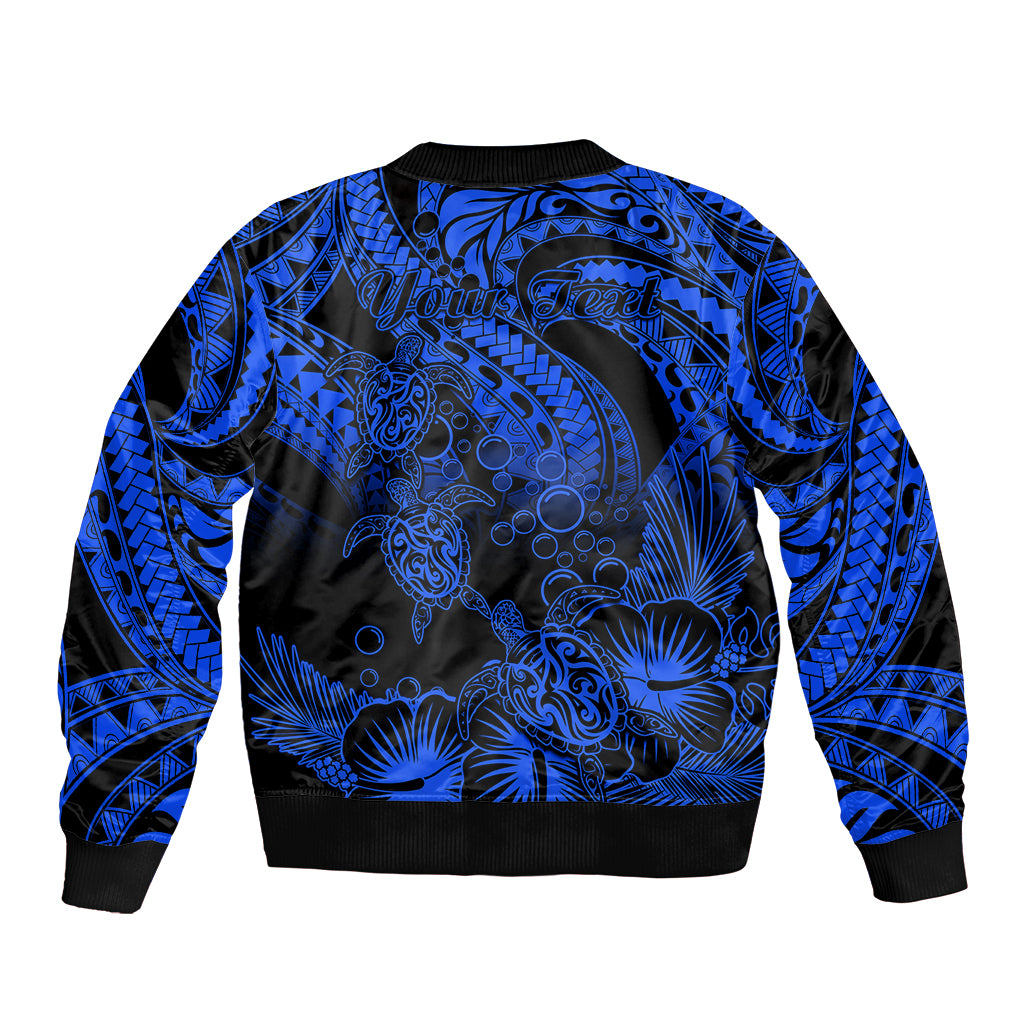 Blue and black bomber jacket with tribal turtle pattern, ribbed collar and cuffs