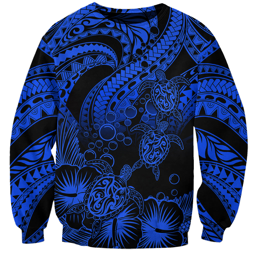 Blue crewneck sweatshirt with black tribal print and honu turtle with hibiscus flowers