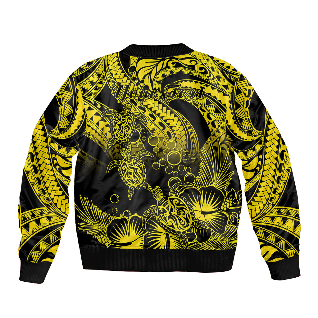 Gold and black tribal-pattern bomber jacket back with ribbed hem and cuffs
