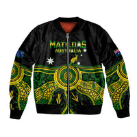 Black unisex bomber jacket with zip front, green/yellow Aboriginal print and Matildas crest