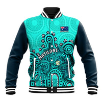 Turquoise and navy baseball jacket with ribbed collar, striped cuffs, Aboriginal-style front art