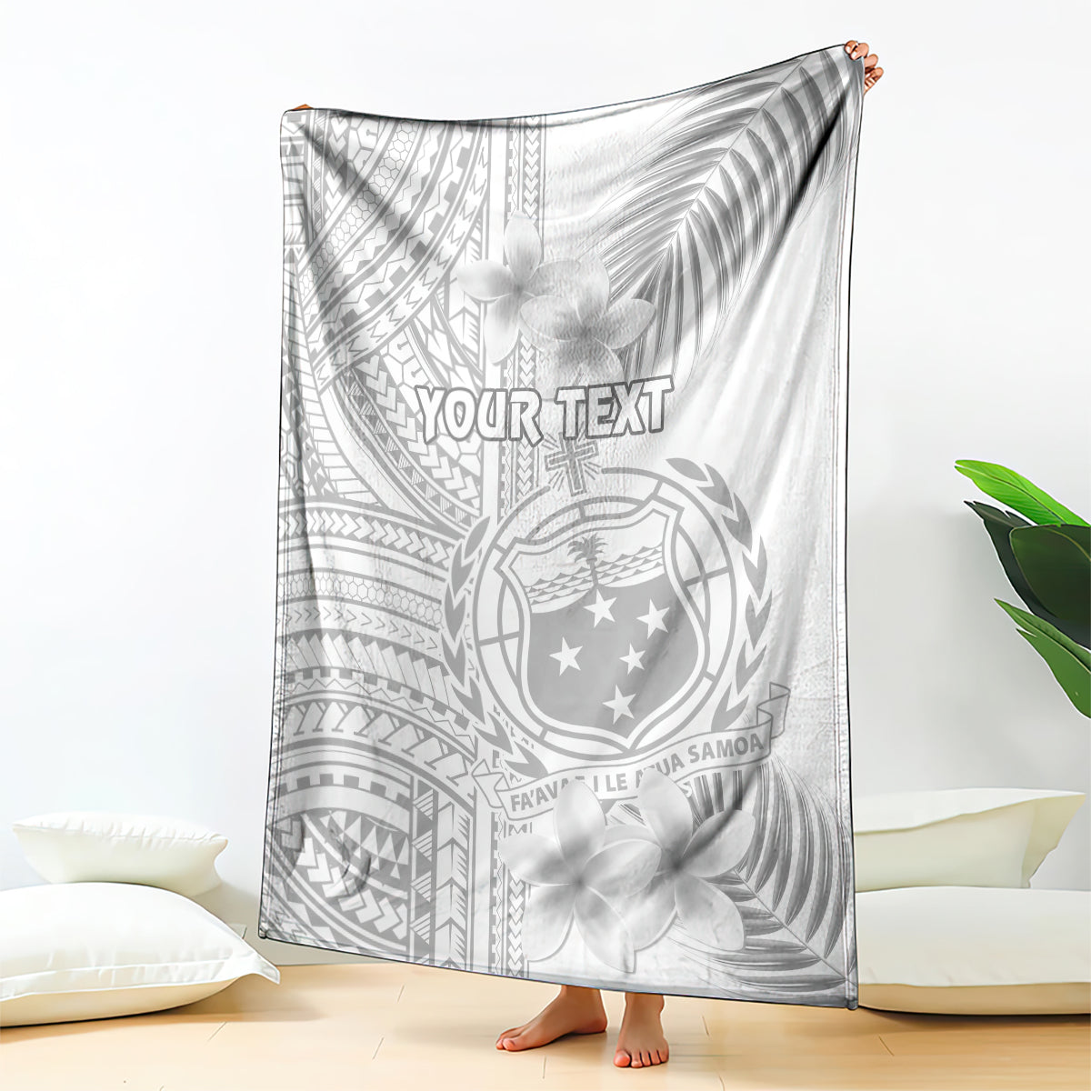 White personalized Sunday blanket with gray Polynesian patterns, plumeria, and shield