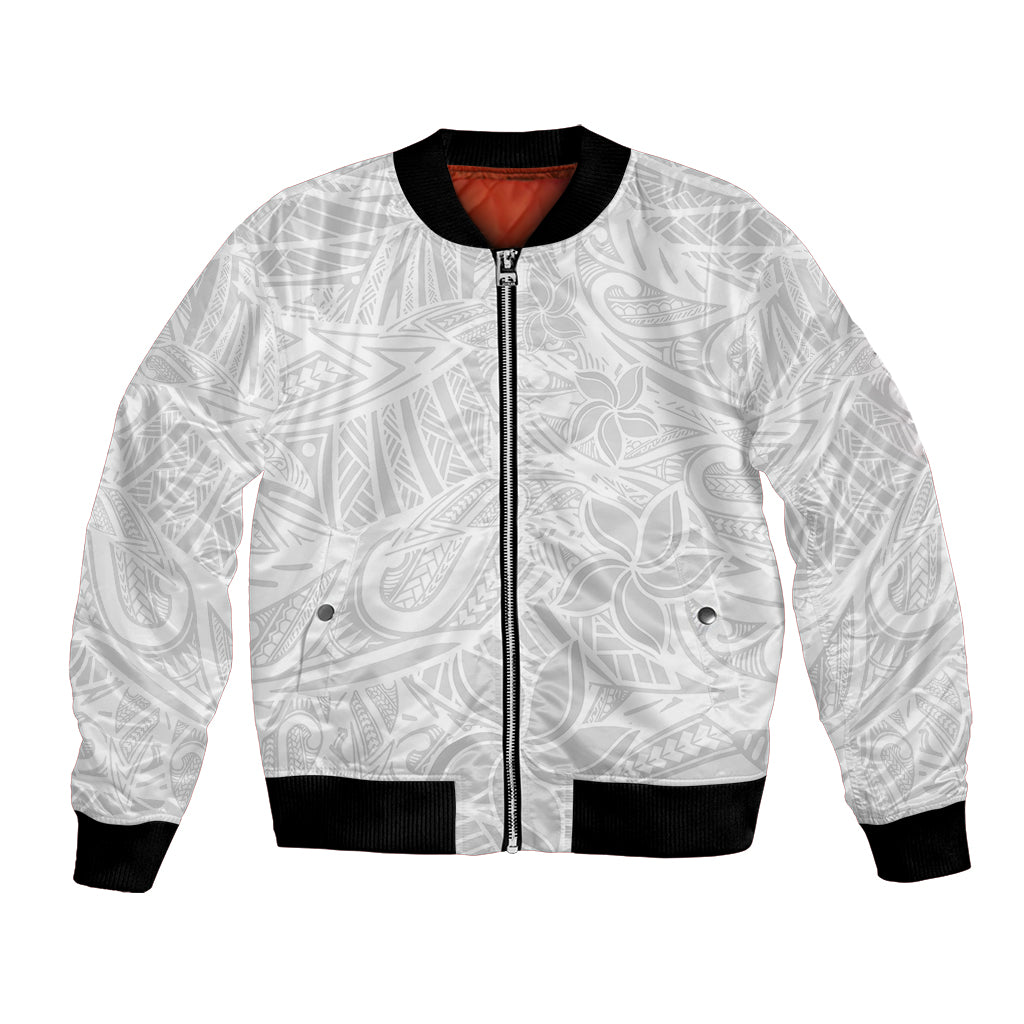 White bomber jacket with tropical leaf/flower print, front zipper, black ribbed cuffs and hem.