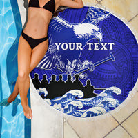 Round blue beach blanket with white eagle and ocean waves, 'YOUR TEXT', white fringe