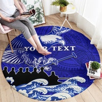Round blue area rug with eagle motif and Polynesian pattern, custom text across center