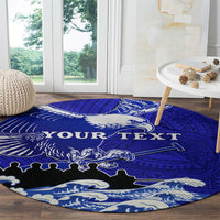 Round blue area rug with eagle crest and Polynesian pattern, custom text banner