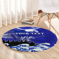 Round blue area rug with eagle emblem, Polynesian pattern border, custom text