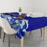 Blue eagle and Polynesian geometric wave pattern tablecloth corner drape over dining table