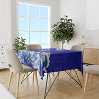 Blue Polynesian patterned tablecloth featuring eagle motif on dining table