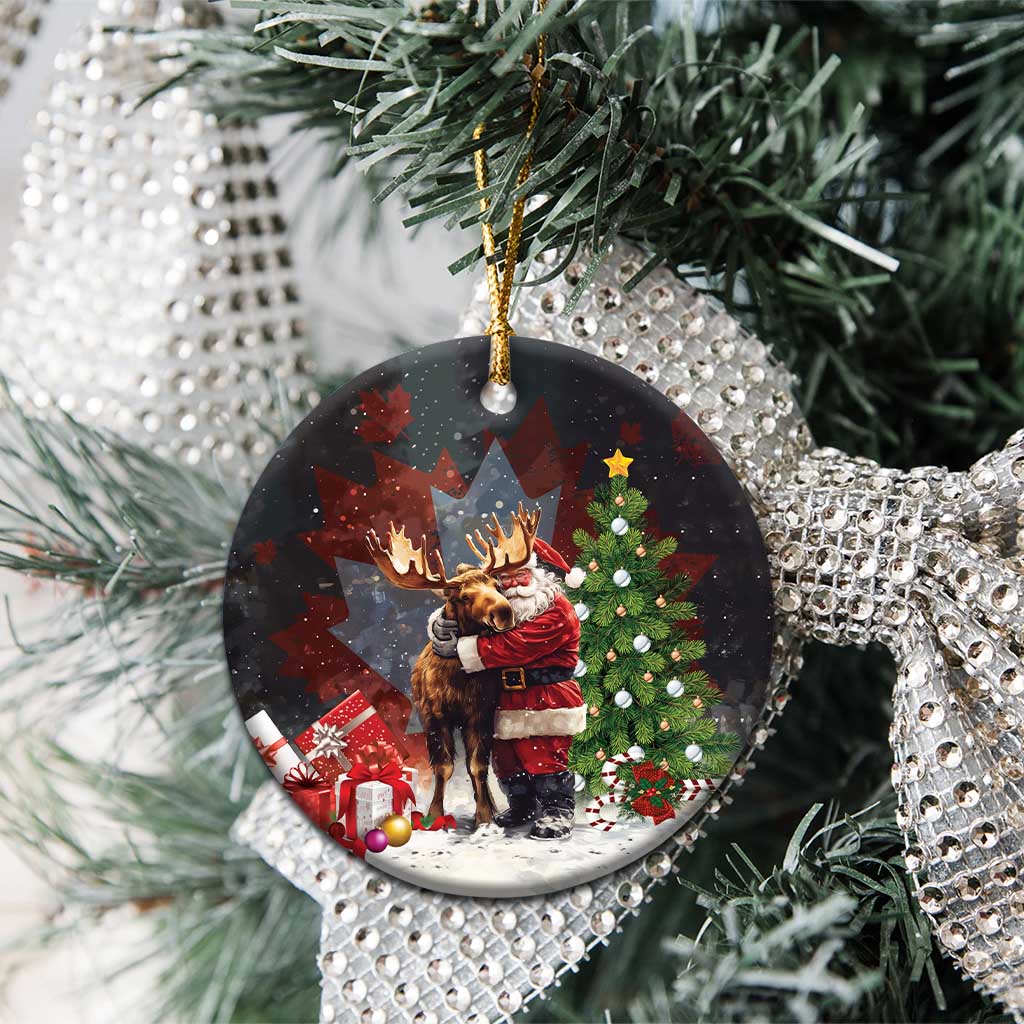 Black round ceramic Christmas ornament hanging on a tree, Santa hugging a moose design.