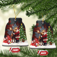 Black ceramic Christmas ornament shaped like a tree, Santa hugging a moose; front and back tags.