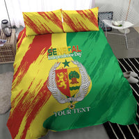 Bedding set featuring yellow-red streaks, green panel, coat emblem, and “YOUR TEXT”