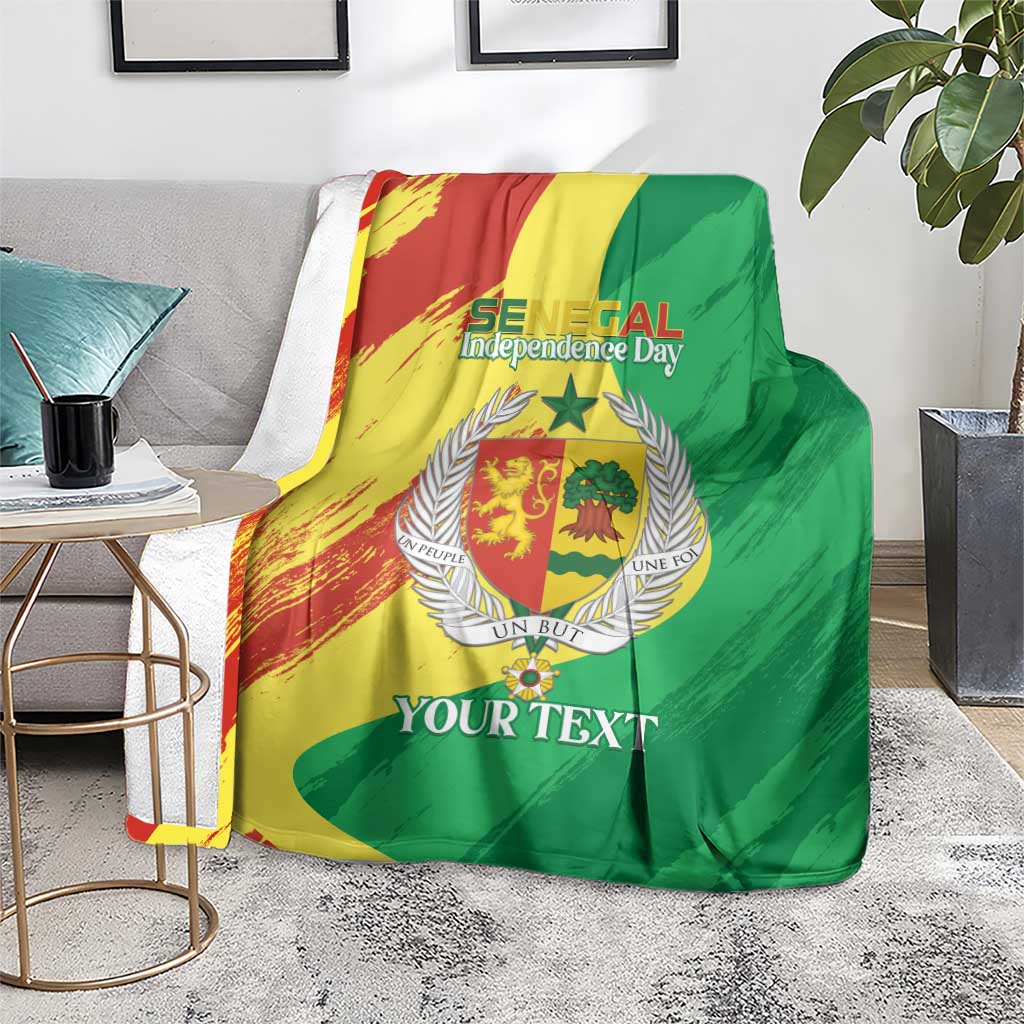 Senegal Independence Day blanket folded on chair, red-yellow-green flag with 'SENEGAL' text