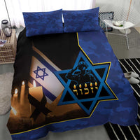 Blue camouflage duvet and two pillows with Star of David, candles, and Hebrew text panel