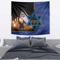 Blue camouflage tapestry with Star of David and candle flames above a bed