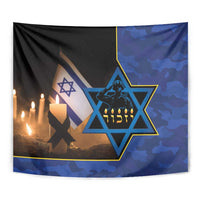 Blue camouflage memorial tapestry close-up with Star of David and candle flame symbols