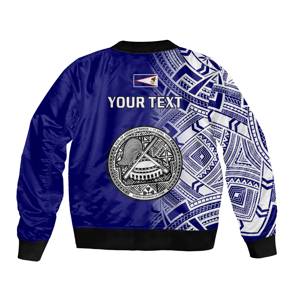 Blue bomber jacket back with large circular emblem and "YOUR TEXT" across white tribal print