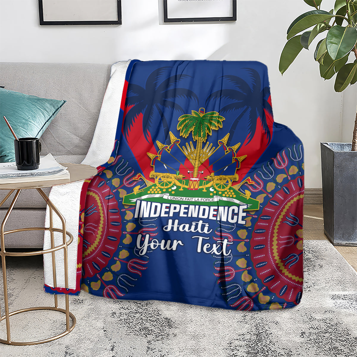 Blue blanket on a chair featuring palm trees and Independence Haiti Your Text
