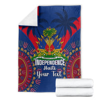 Folded blue Haiti independence day blanket with dashiki pattern, palm trees, and Independence text