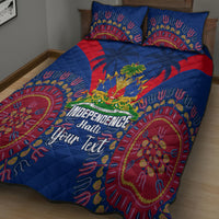 Blue quilt bed set with red accents; Independence Haiti "Your Text" on the quilt.