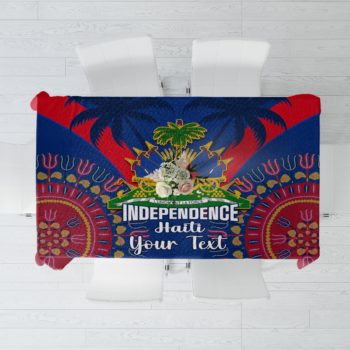 Blue tablecloth with Independence Haiti text and dashiki-style pattern, red and gold accents