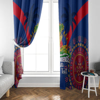 Blue window curtain with red diagonal sections and centered Independence Haiti graphic.