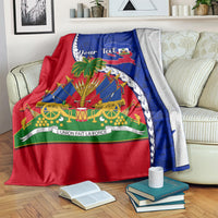 Red and blue Haiti emblem blanket draped over couch with custom text and emblem map