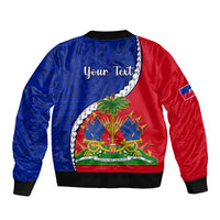 Haiti-inspired bomber jacket with red and blue back graphic and ribbed hem