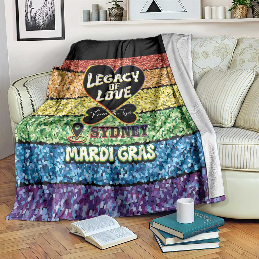 Black and multicolor mosaic blanket with “Legacy of Love,” Sydney, and Mardi Gras text